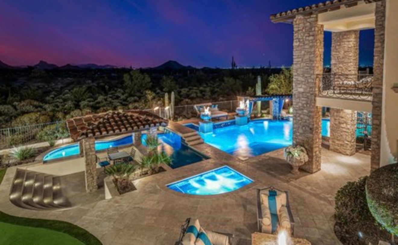 The 9297 house pool and patio at night